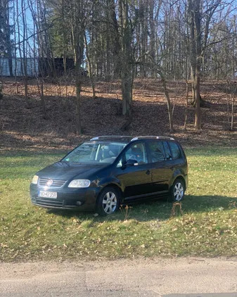 warmińsko-mazurskie Volkswagen Touran cena 19000 przebieg: 213594, rok produkcji 2004 z Olsztyn